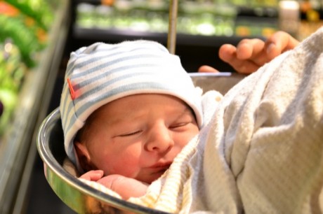 Weighing baby at the supermarket